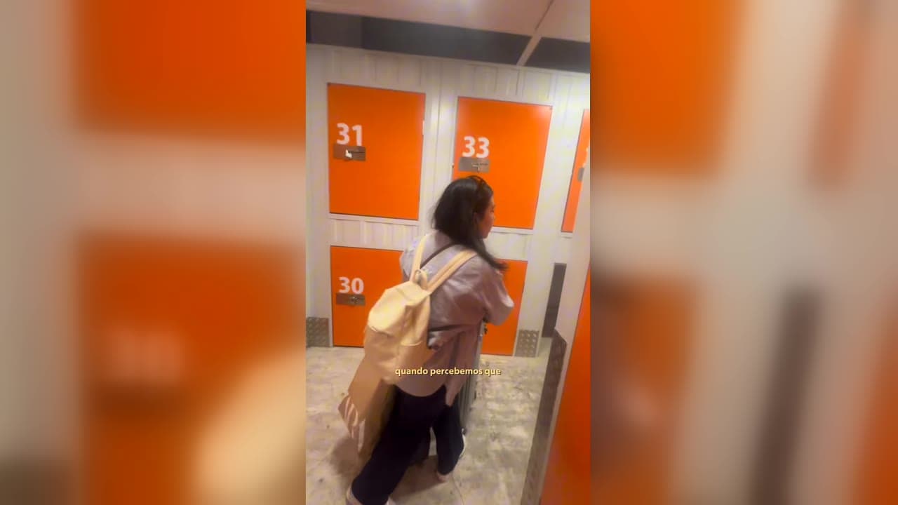 Karol Barbosa abrindo a porta do depósito em Madri e encontrando o espaço vazio